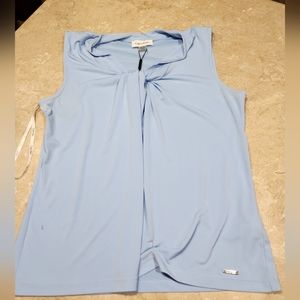 Calvin Klein,Women's Medium Top. Light sky blue color